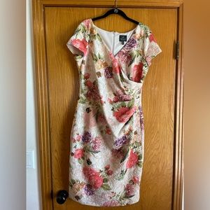 BHLDN Knee length knit dress with rose gold threads woven into the fabric.